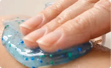 Massaging Kinzeno gel into the skin in circular motions